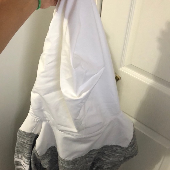 Grey zip up sweater with a hood that is waterproof - Picture 4 of 4